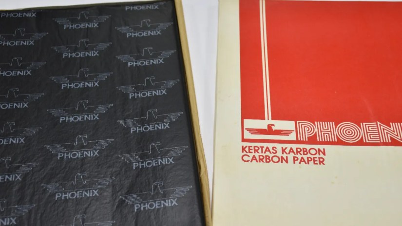 Carbon paper in a box laying on a flat surface