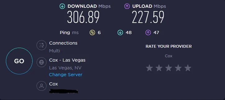 A Lenovo network speed test showing 306 download speed and 227 upload speed