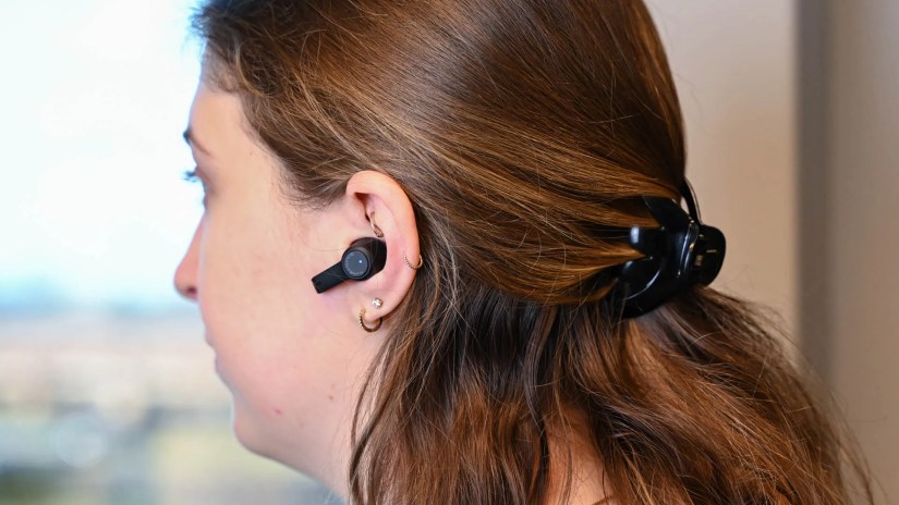 Person using SoundPEATS T3 earbuds