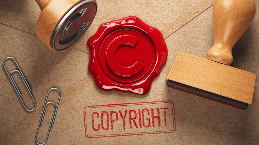An illustration of a copyright stamp on a letter.