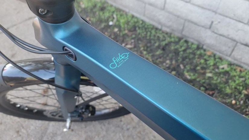 fiido logo on the body of fiido x folding e-bike