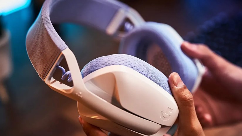Logitech G435 being held