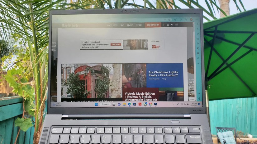 The Lenovo ThinkPad X1 Carbon laptop&rsquo;s anti-glare screen outside in the sun.