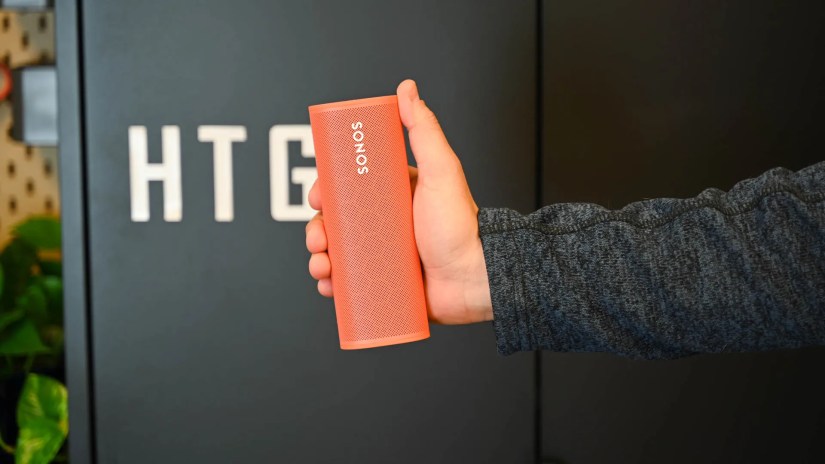 Person holding Sonos Roam