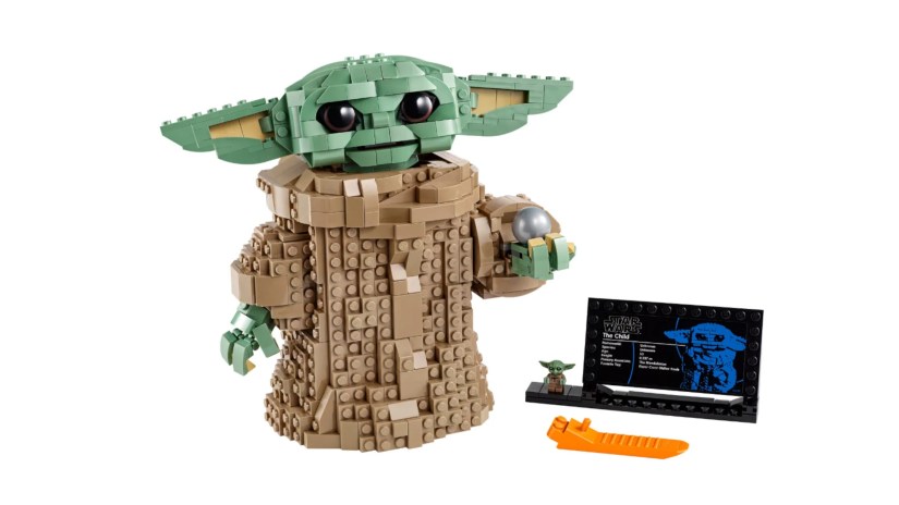 A LEGO model of The Child sits against a white background.