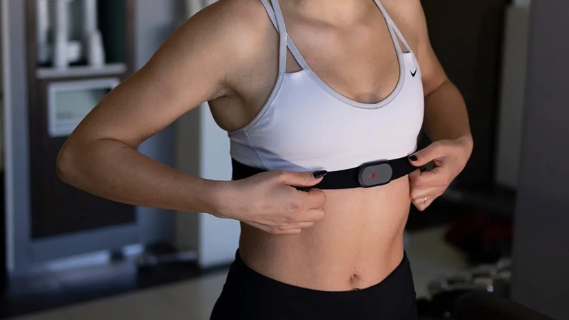Person putting on Polar H9 heart sensor