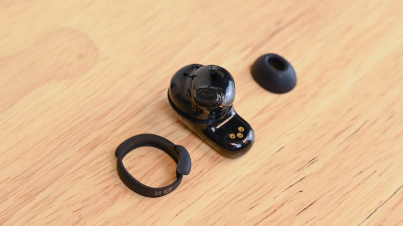 A Bose QuietComfort Earbud 2 with an ear tip and a stability band
