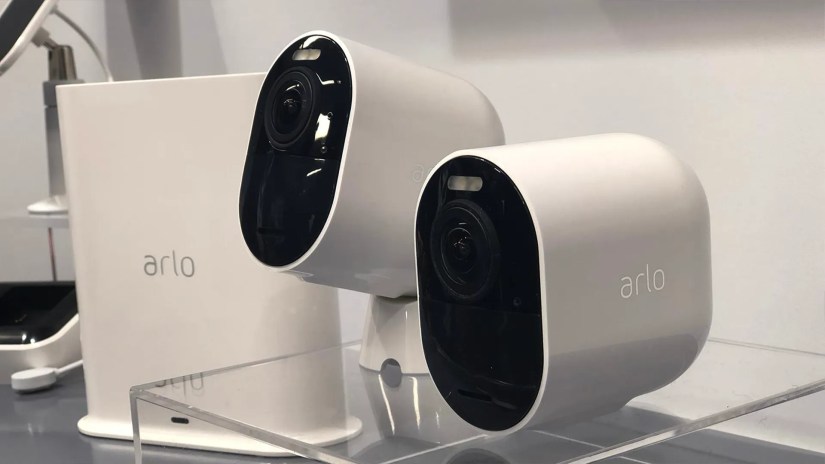 A pair of Arlo battery-powered smart security cameras