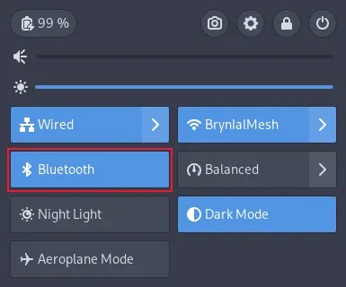 The GNOME quick settings menu with the Bluetooth button highlighted