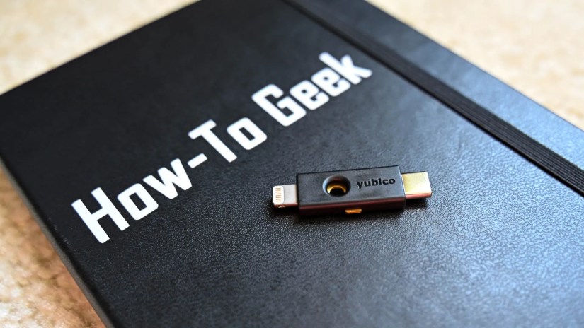 The Yubico Yubikey 5CI laying on a notebook