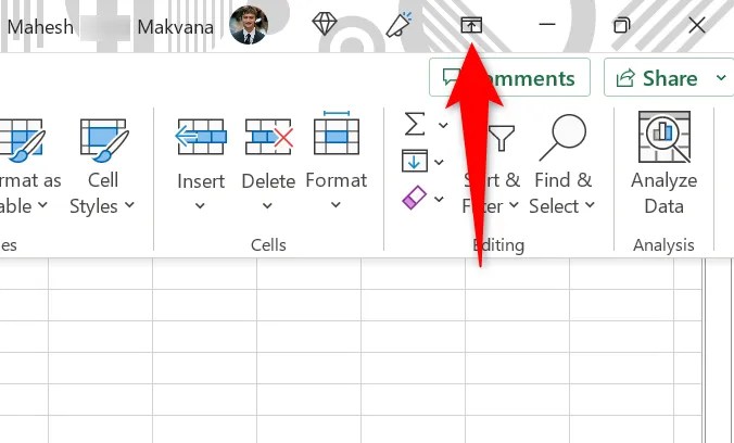 Choose the up-arrow icon at the top-right corner.