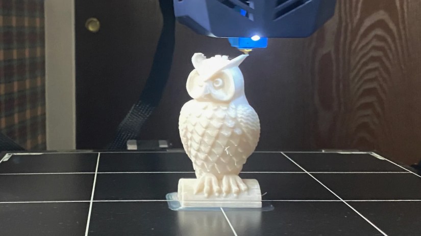 The AnyCubic Kobra Plus printing an owl statue.