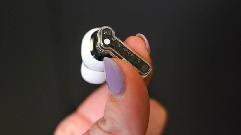 Person holding a nothing ear 2 earbud