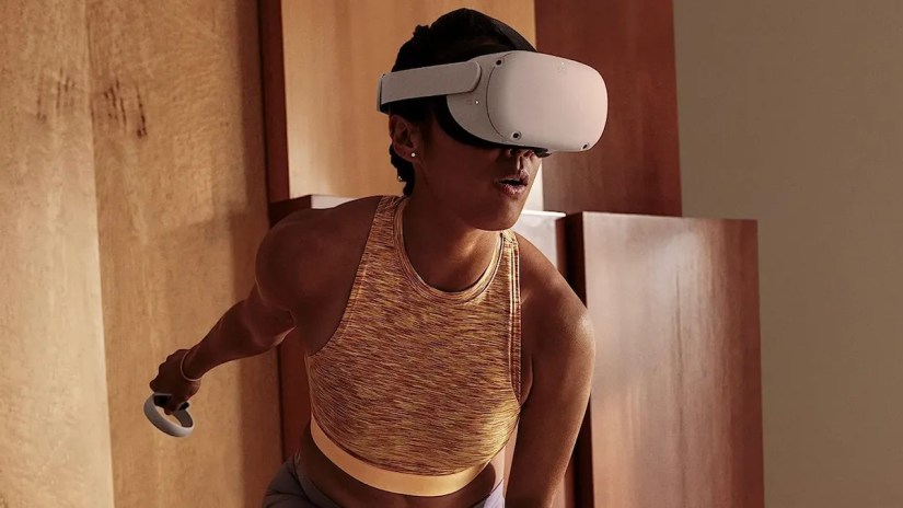 Women using the Meta Quest 2 VR headset.