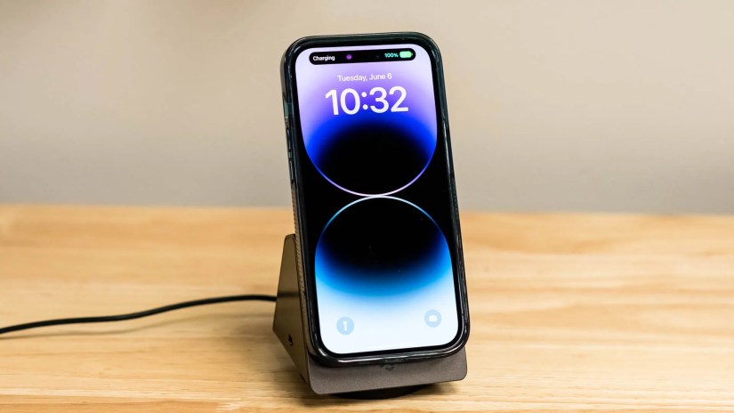 An iPhone docked on the PITAKA MagEZ Slider 2.