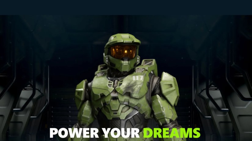 Master Chief from Halo stands near the words &quot;Power Your Dreams.&quot;