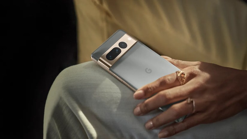 Closeup of a woman holding a Google Pixel 7 Pro phone.