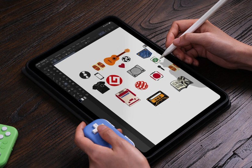 Using the 8BitDo Micro in keyboard mode to streamline functions in an iPad illustrator app.