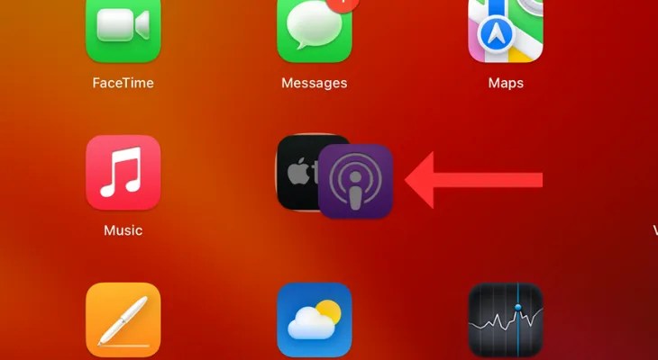 MacBook&rsquo;s Launchpad with an arrow next to a folder