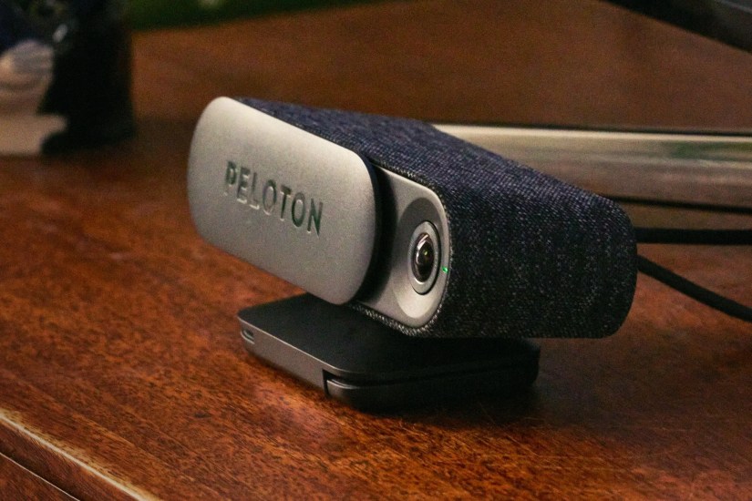 peloton guide on tv stand