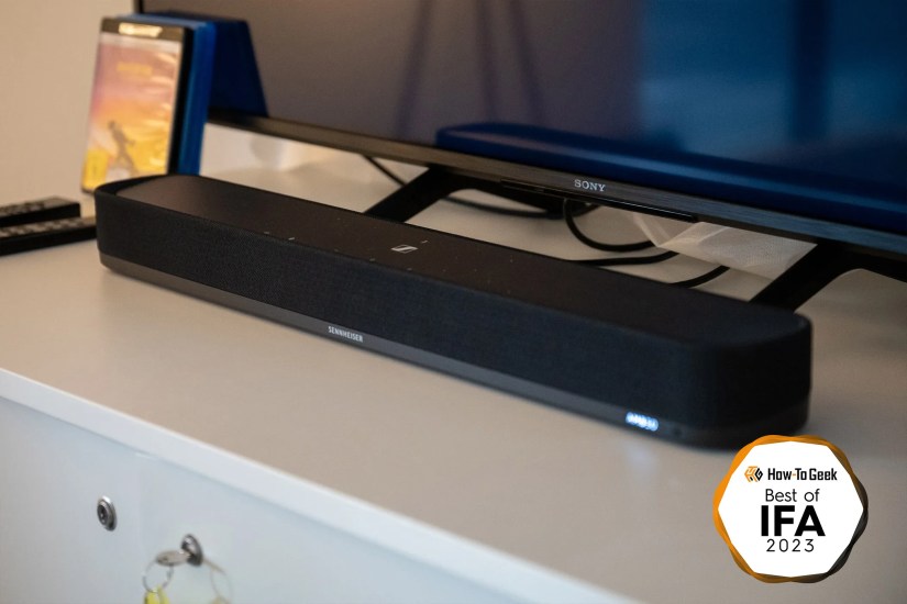Sennheiser Ambeo soundbar on a table in front of a TV