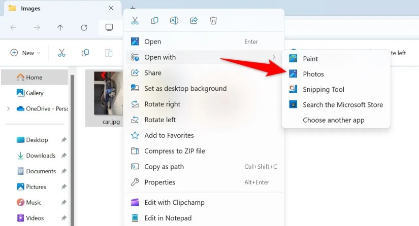 Open With &gt; Photos highlighted in a photo&rsquo;s context menu.