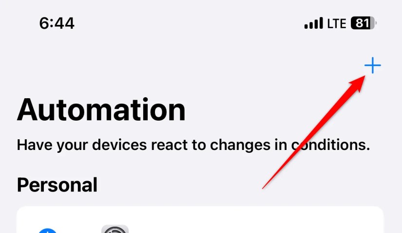 The &lsquo;plus&rsquo; button for creating a new automation in the iPhone Shortcuts app.