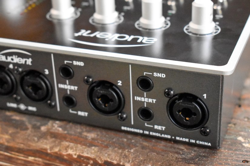 The XLR microphone inputs on an Audient id44 audio interface.