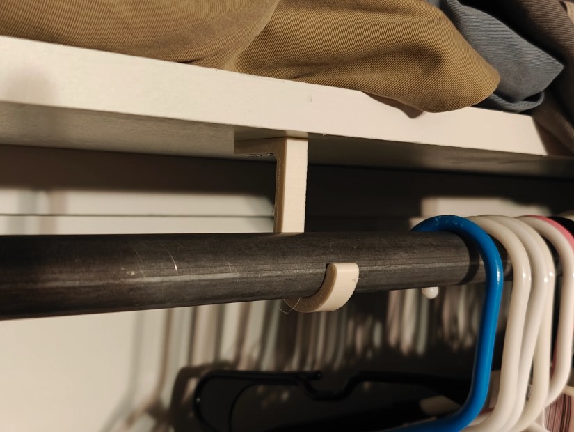3D printed closet rod support.