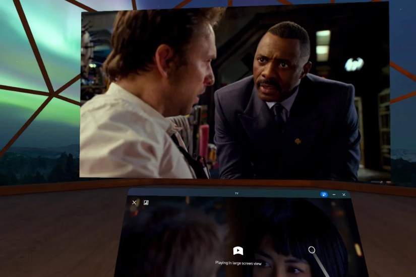 A floating controller window with a movie projected above it.