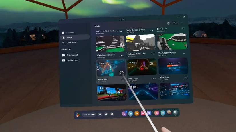 Browsing the media gallery in a virtual reality environment.