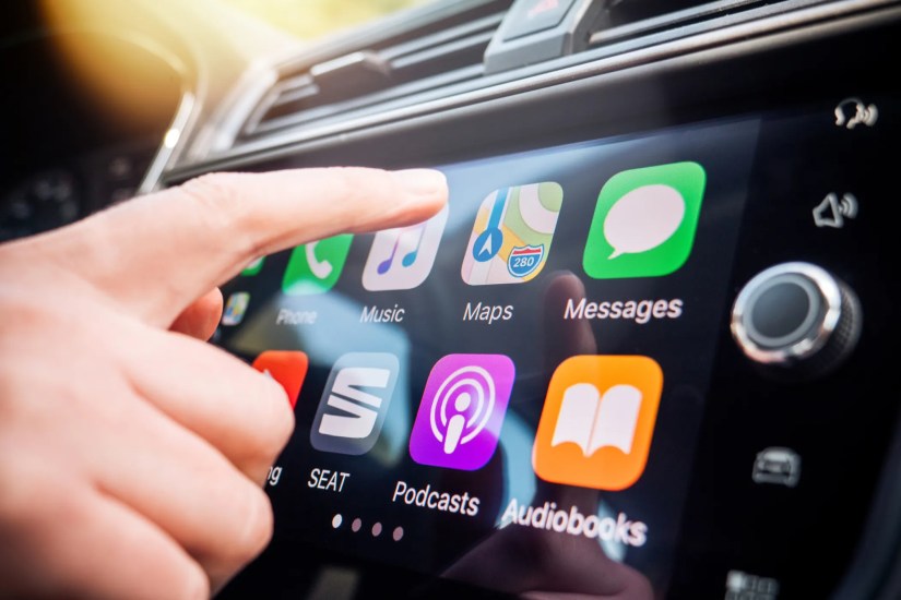 Using Apple CarPlay with a car&rsquo;s entertainment unit.