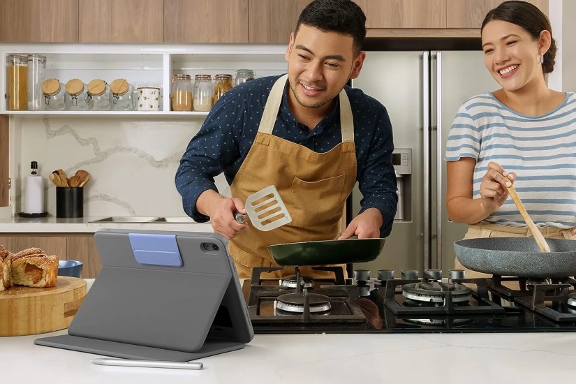 People using iPad in Logitech Rugged Folio while cooking