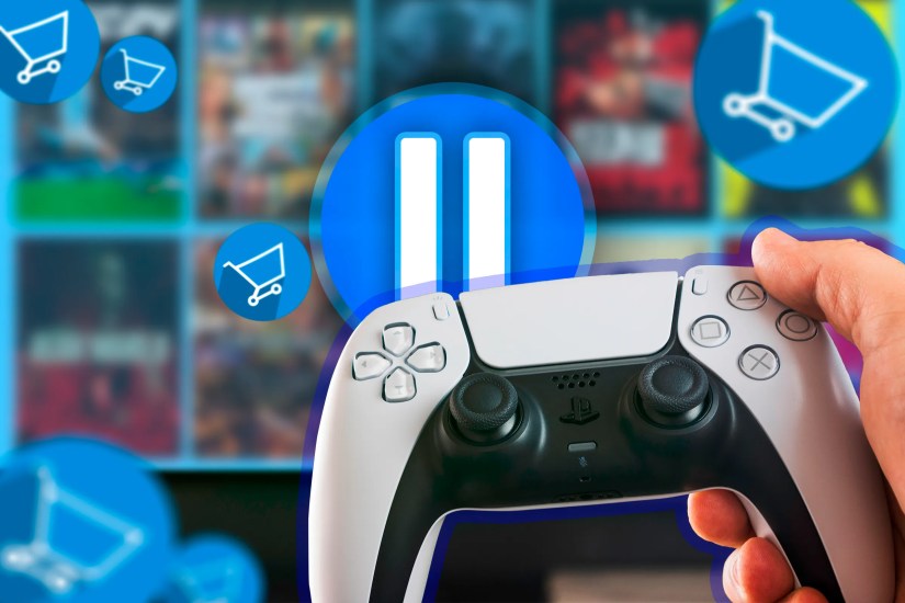 A hand holding a video game controller and a pause icon on the screen.