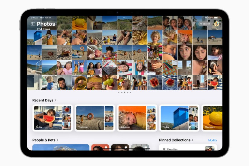 New Apple Photos app showcasing the Collections at the bottom.