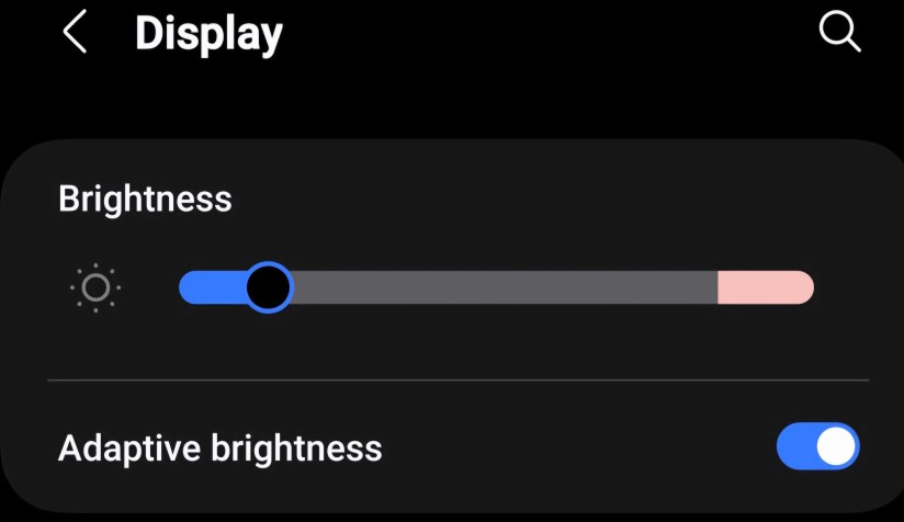 Enabling the adaptive brightness settings in Android settings