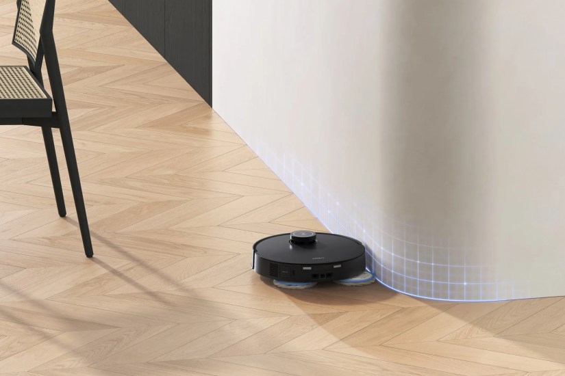 Deebot T30S Doing TruEdge Cleaning Along a Wall
