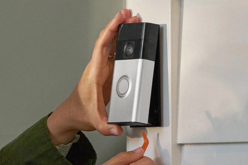 Removing the Ring Battery Doorbell from the wall.