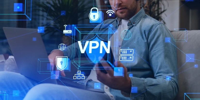 A stylized of a man holding a phone with &lsquo;VPN&rsquo; superimposed.
