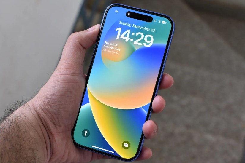 iPhone 16&rsquo;s screen with the default wallpaper.