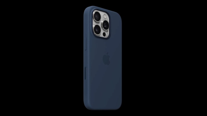 iPhone 16 Pro in Apple&rsquo;s silicon case, set against a sold black background.