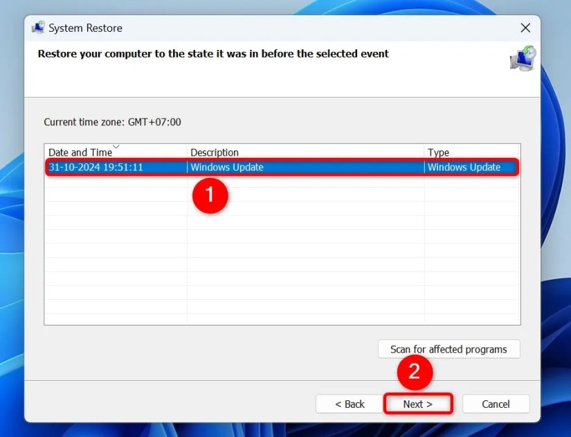 A restore point and &lsquo;Next&rsquo; highlighted in System Restore.