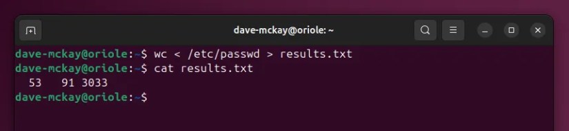 Using redirection to read a file into a command&rsquo;s stdin stream and send the output to a different file.