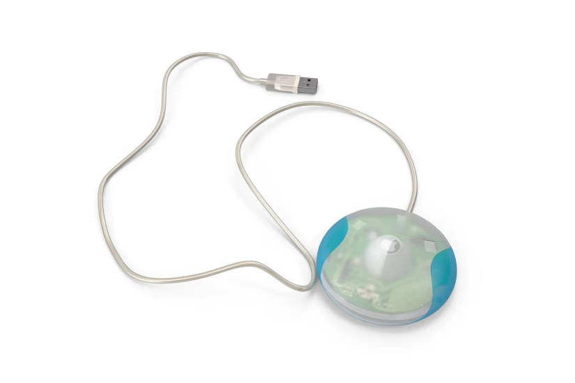 An example of an old puck shaped Apple mouse from the early 2000s.