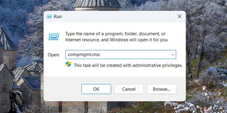 Opening the Computer Management console on Windows 11 using the Run dialog box.