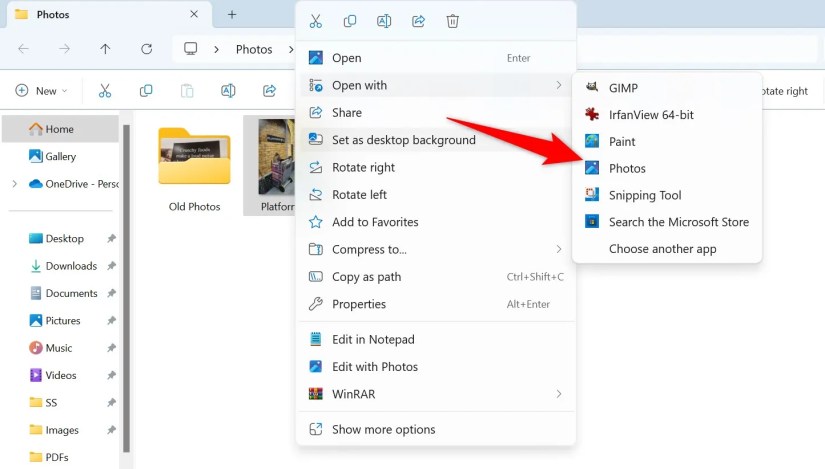 Open With &gt; Photos highlighted for a photo in File Explorer.