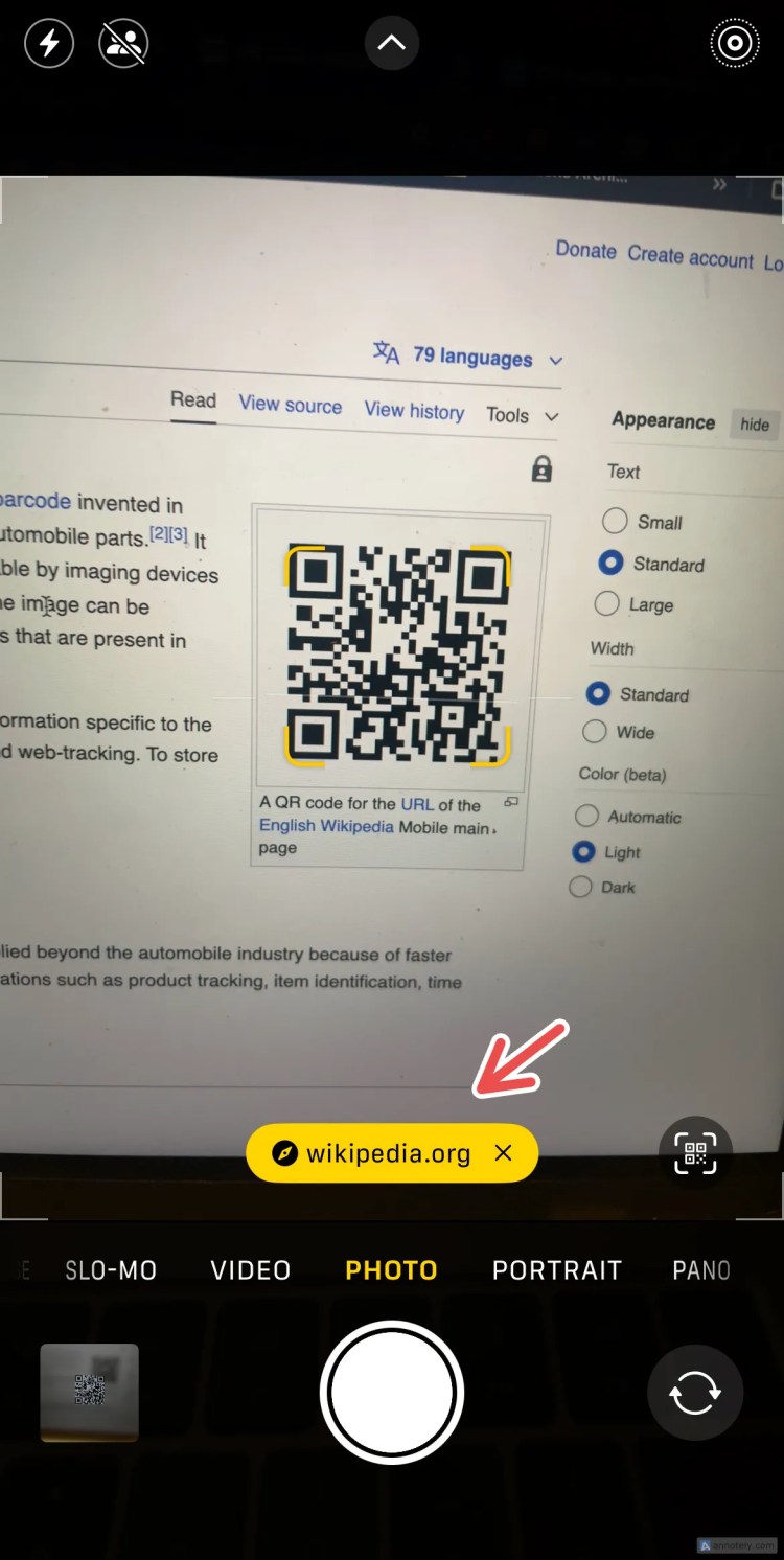 Using iPhone&rsquo;s Camera app to scan a QR code.
