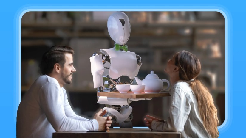 A robot serving two people at a restaurant table.