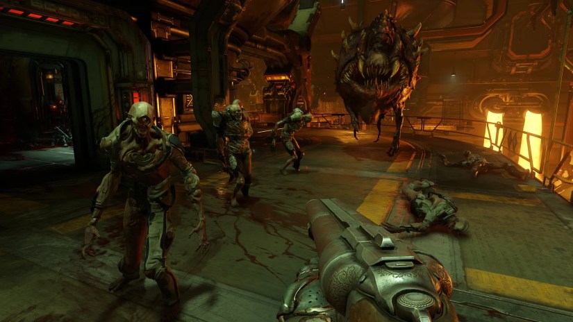 Official DOOM 2016 screenshot showing various demons and the player&rsquo;s shotgun.