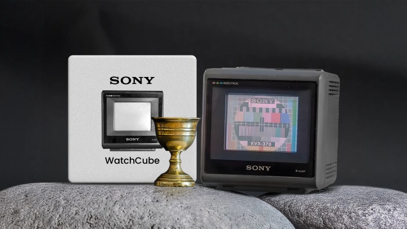 A chalice on a stone with a Sony WatchCube KVX-370 next to it.
